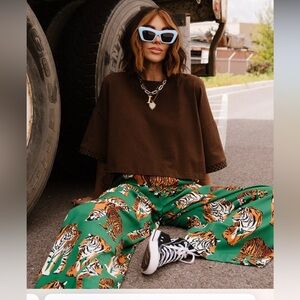 Dressed in Lala Frankie’s cropped tee